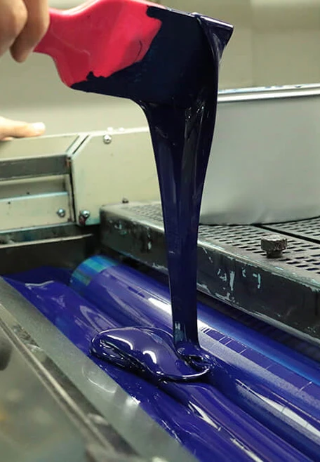 Pouring blue paint
